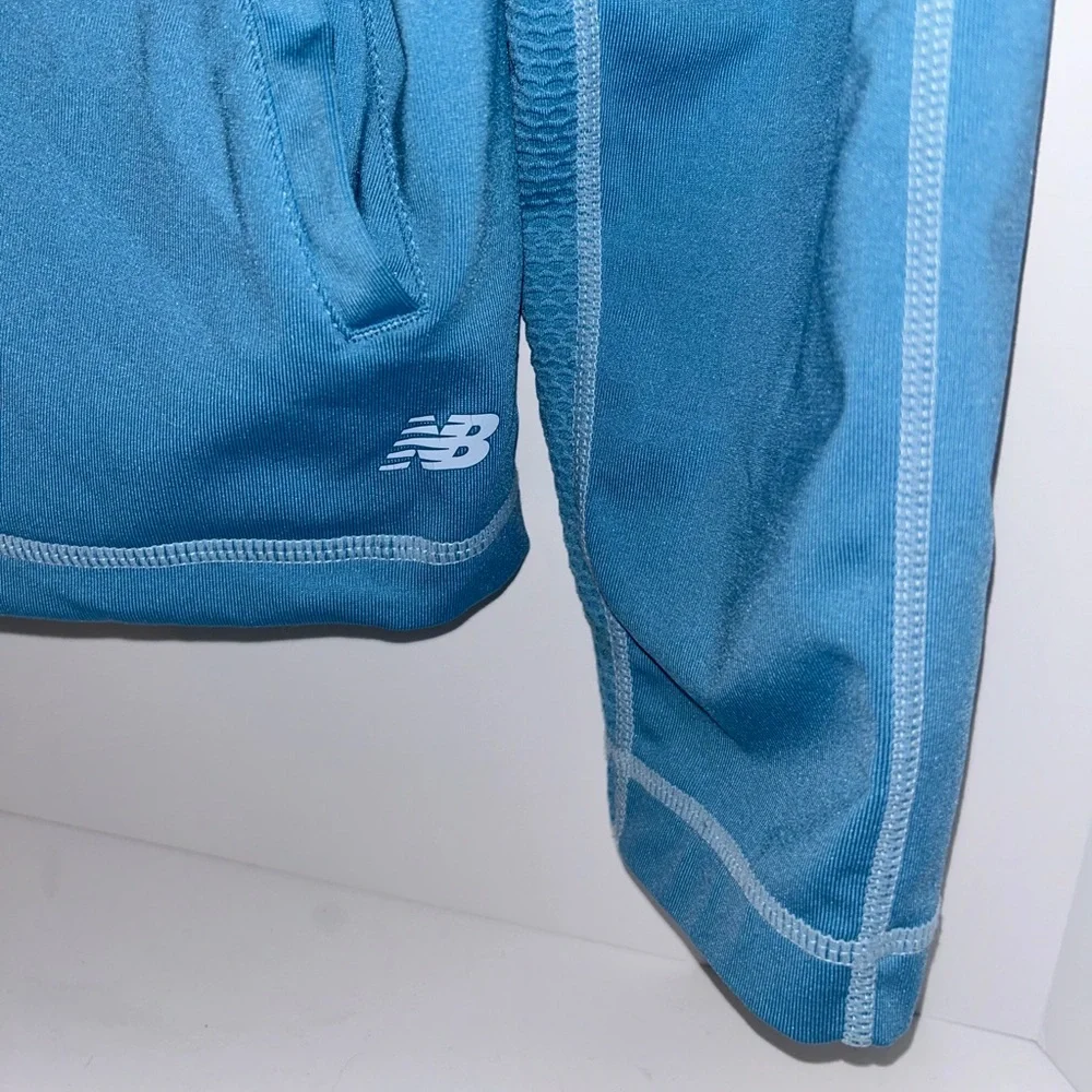 New Balance NB women’s baby blue full‎ zip Lightning Dry jacket size LARGE